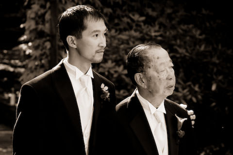 Dave and his dad walking down the aisle at our wedding