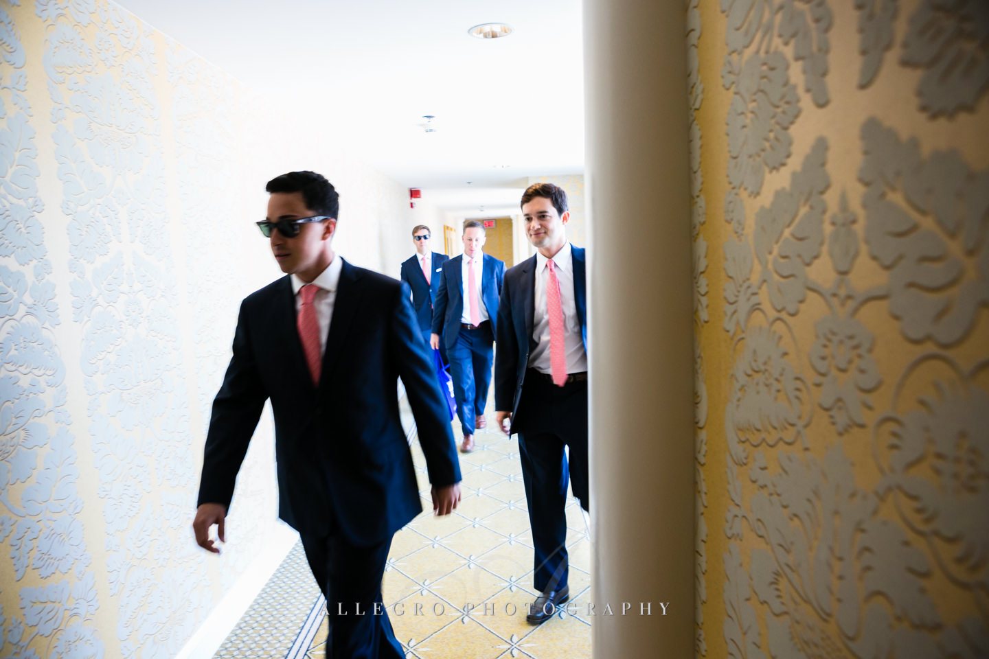 men walking at the four seasons hotel boston - photo by Allegro Photography