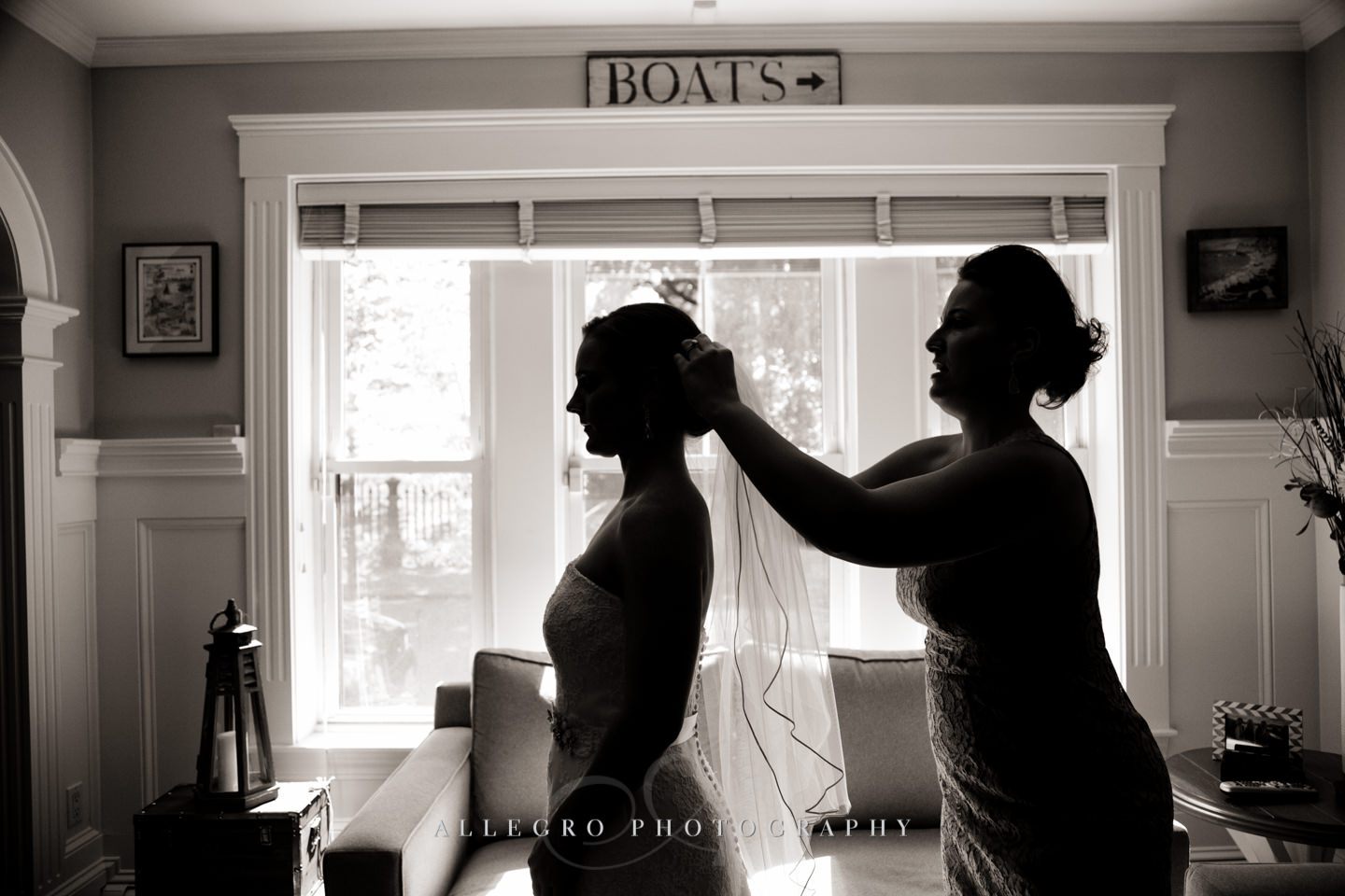 sister puts on veil - photo by Allegro Photography