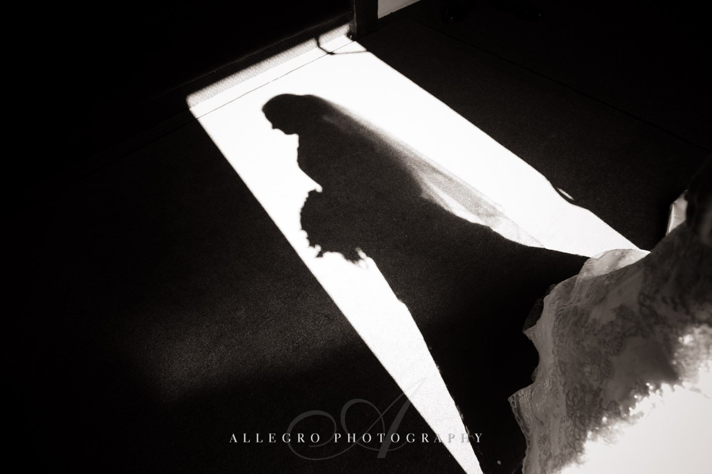 bride at door shadow- ceremony begins - photo by allegro photography