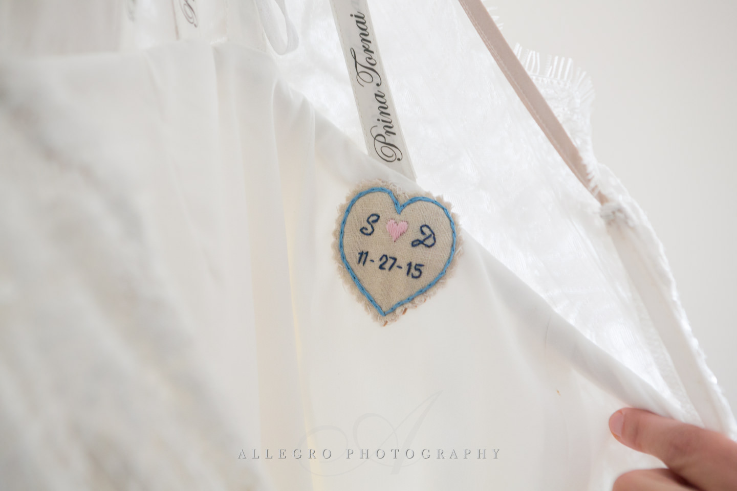 sewn in details with remembrance of wedding date -photo by Allegro Photography