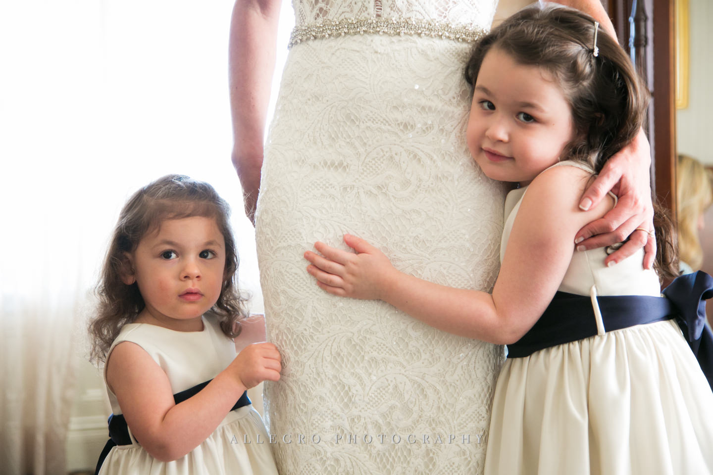 hugs from the flower girls -photo by Allegro Photography