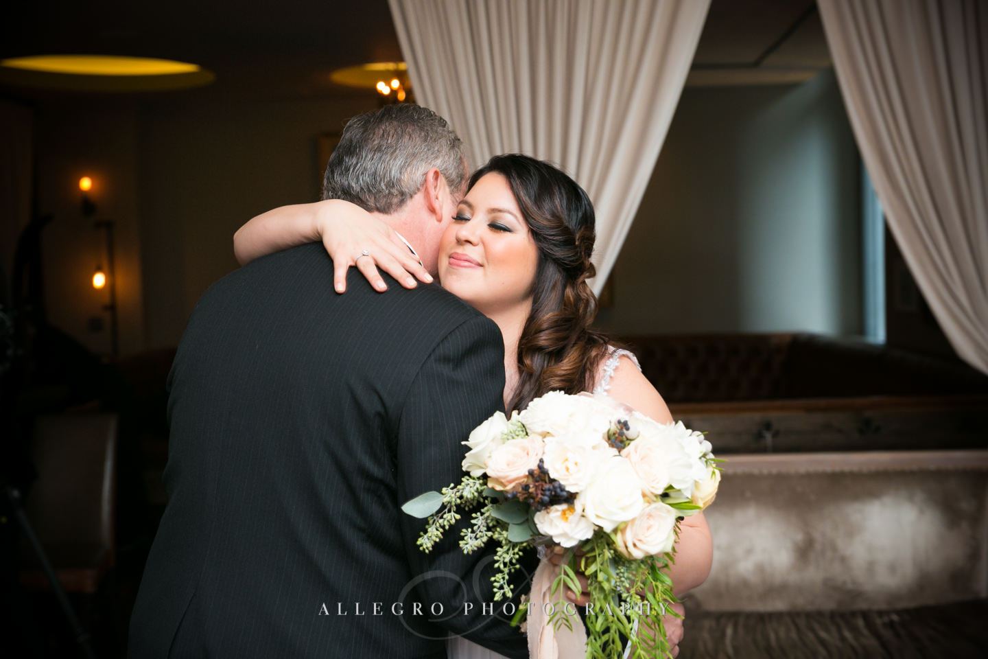 a hug from dad -photo by Allegro Photography