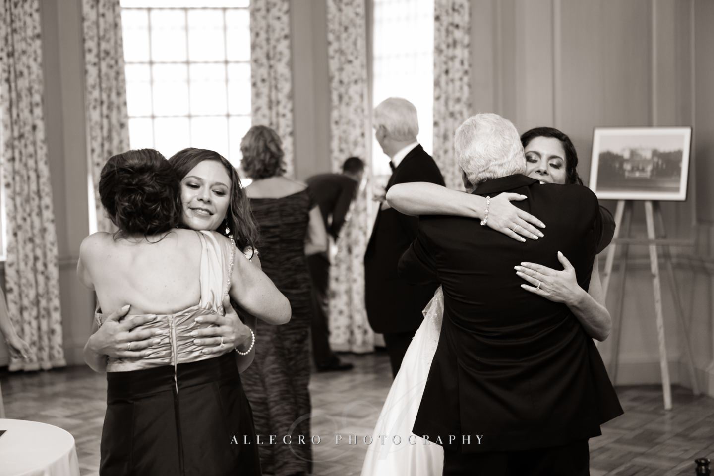 hugging parents of bride - photo by Allegro Photography