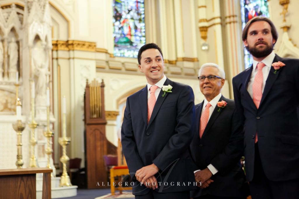 groom sees bride at church - photo by allegro photography