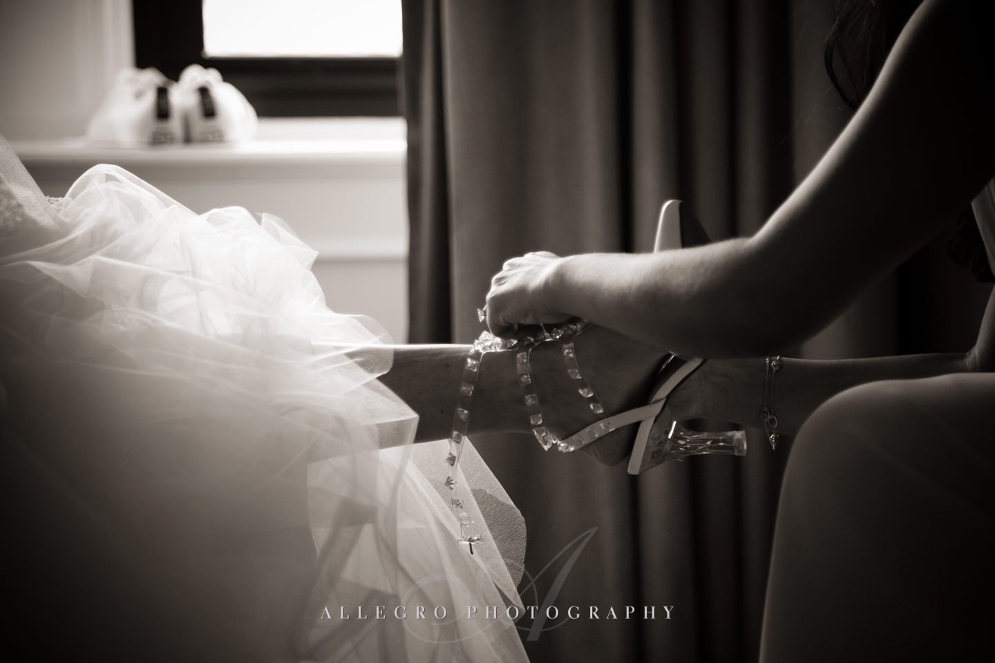 putting on shoes - photo by Allegro Photography