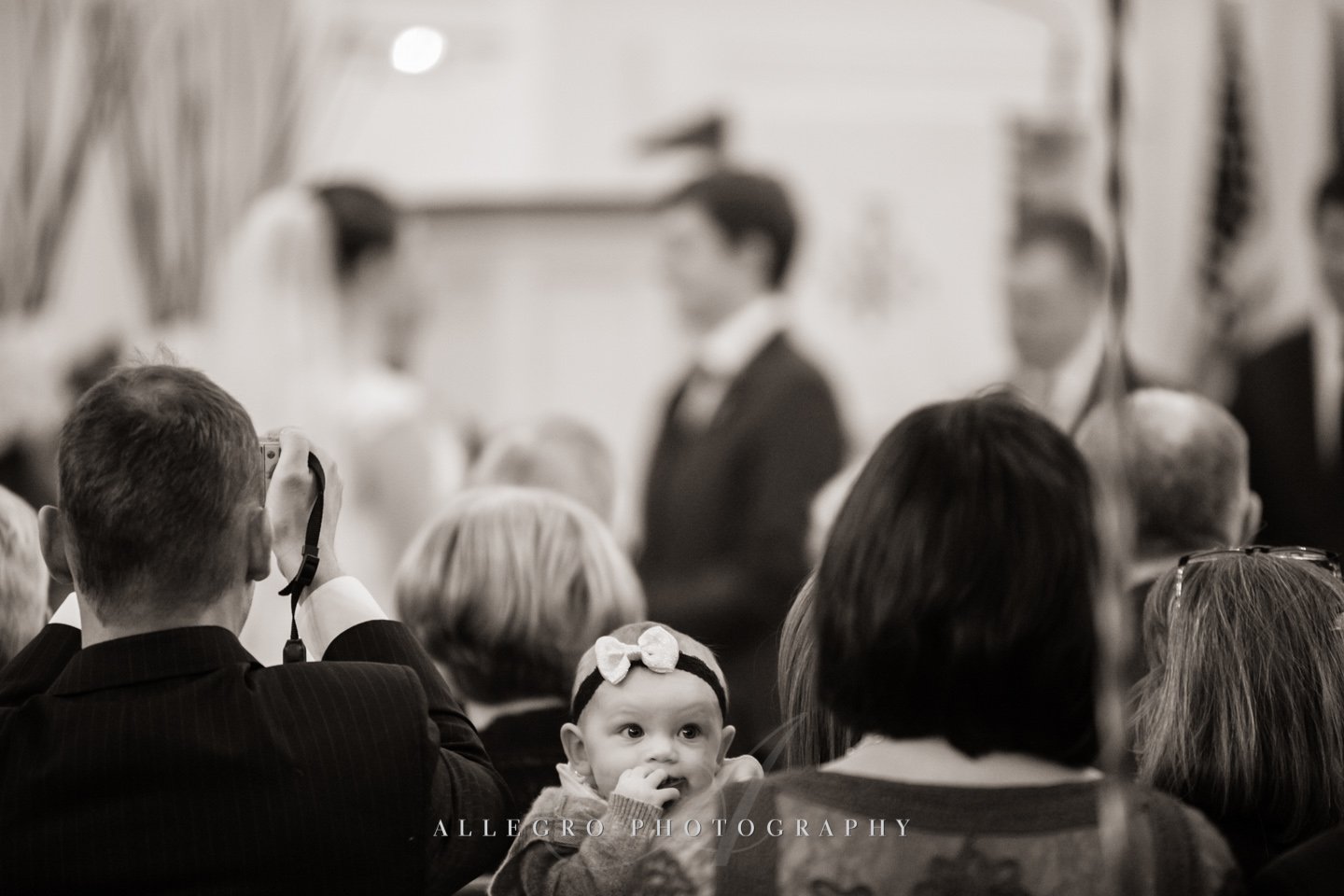 baby at wedding- photo by allegro photography