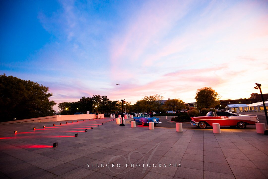 jfk library wedding - photo by Allegro Photography - sunset and classic cars- arrive in style
