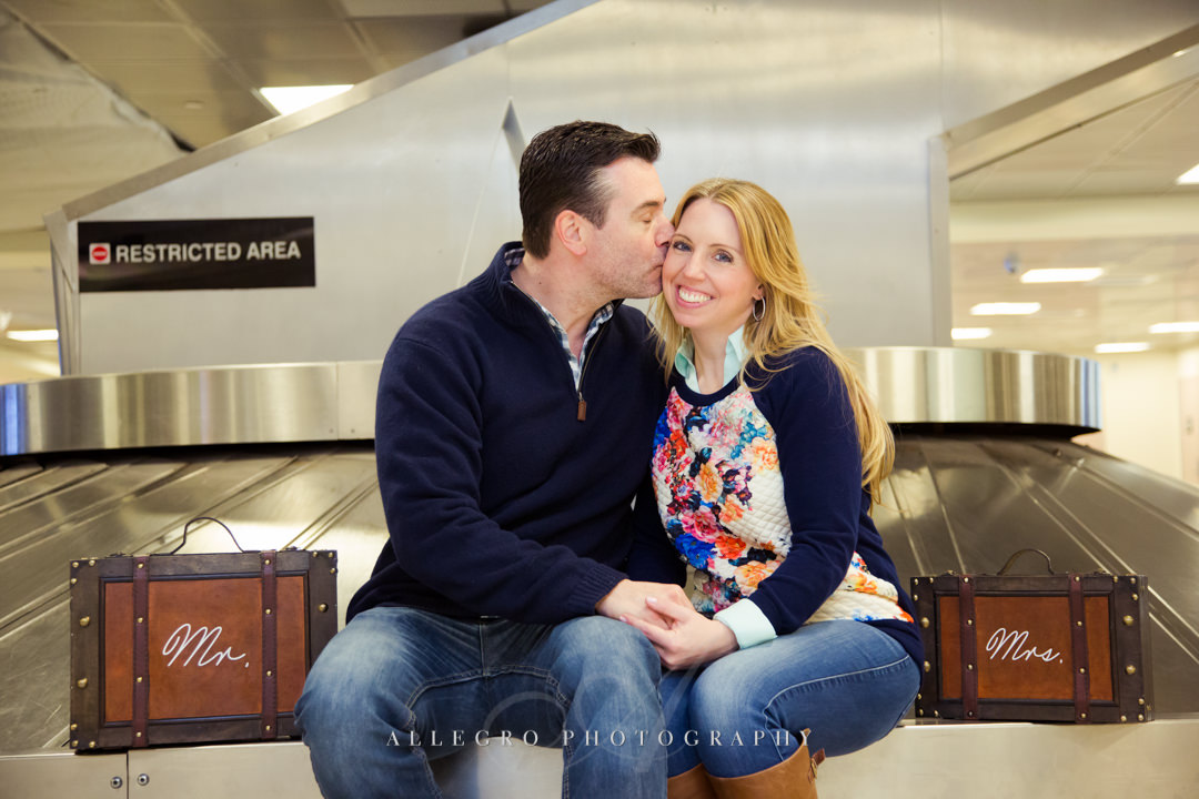 luggage carousel engagement photo - photo by allegro photography