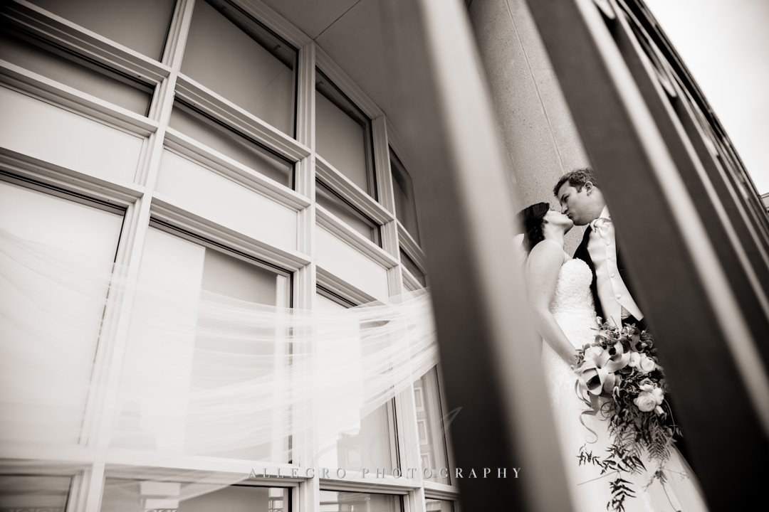 Boston bride and groom kiss, black and white - photo by allegro photography