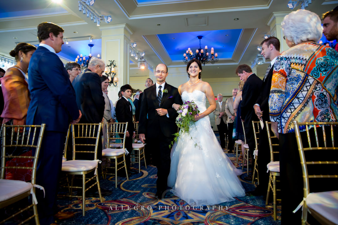 bride walking down the aisle - photo by allegro photography