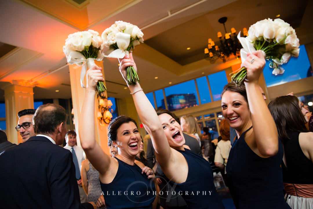 bridesmaids dancing at the boston harbor hotel - photo by allegro photography