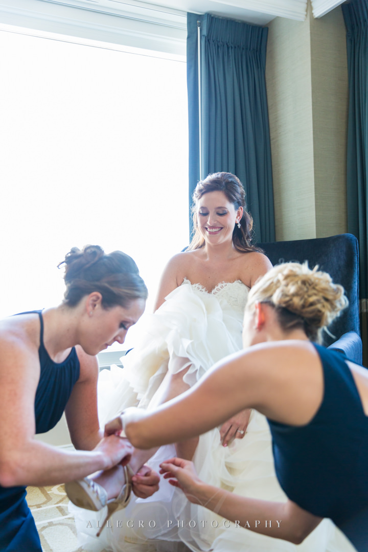 bridesmaids helping out at the boston harbor hotel - photo by allegro photography