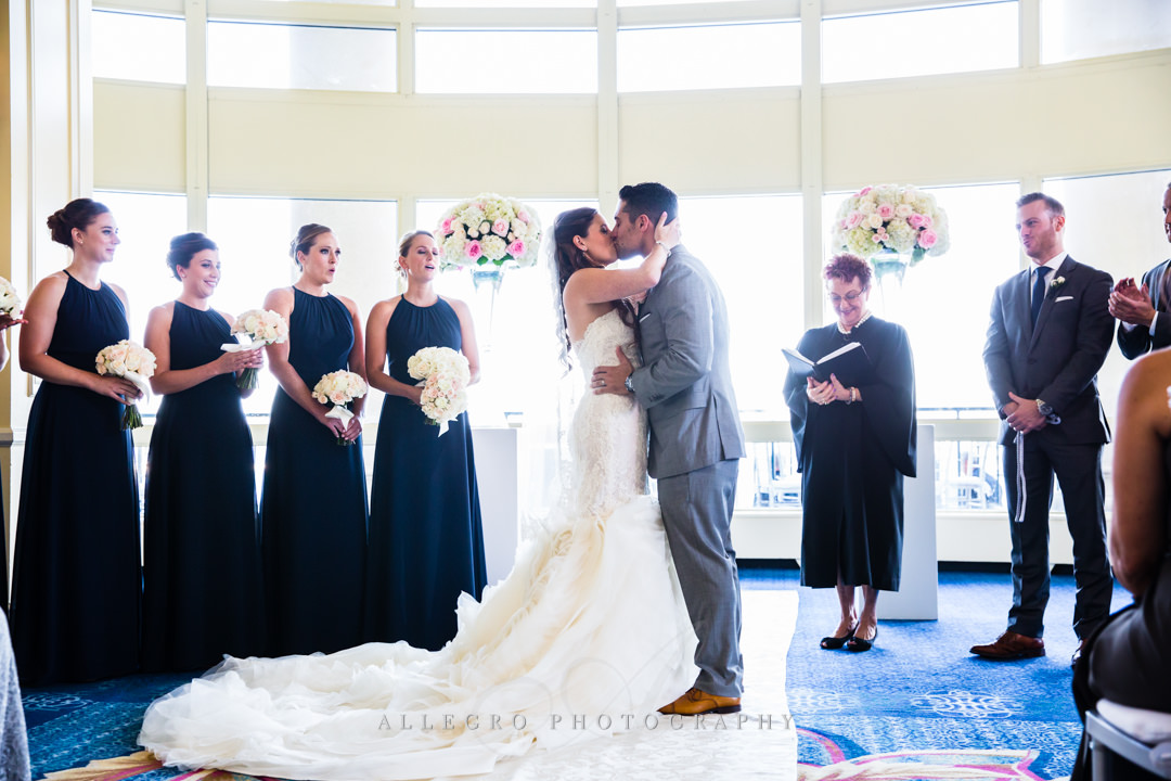 wedding kiss at the boston harbor hotel - photo by allegro photography