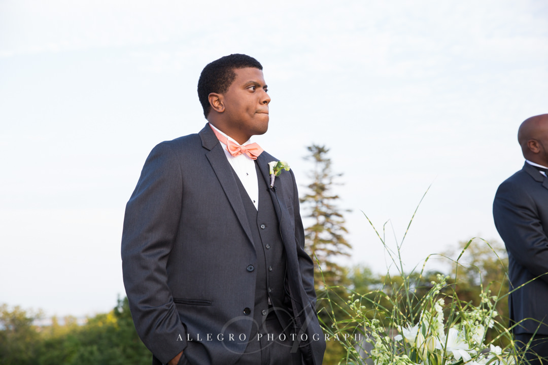 groom's first look at the crane estate - photo by allegro photography
