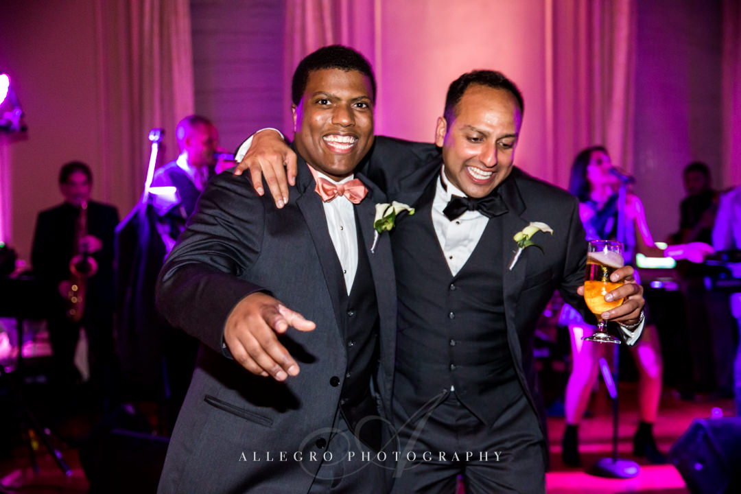 groom dancing at wedding reception at the crane estate - photo by allegro photography