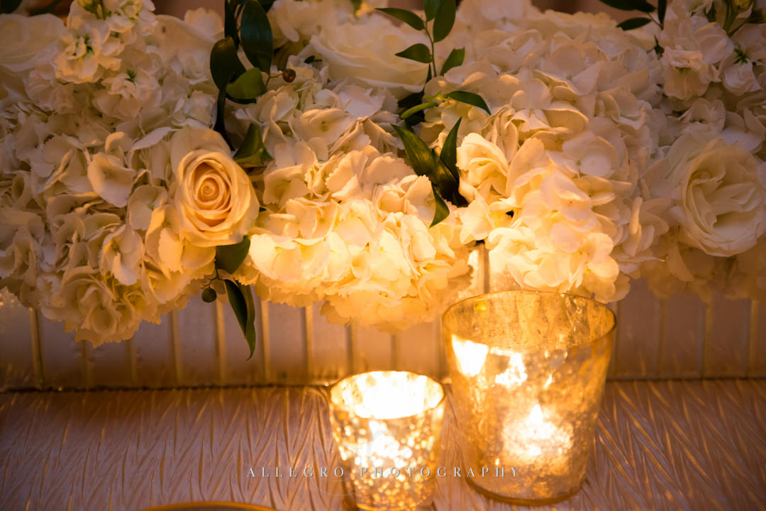 moo restaurant wedding flowers and tea lights - photo by allegro photography