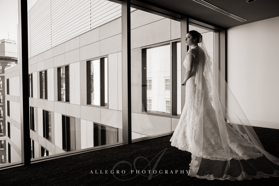 bridal portrait overlooking boston at the hotel commonwealth - photo by allegro photography 