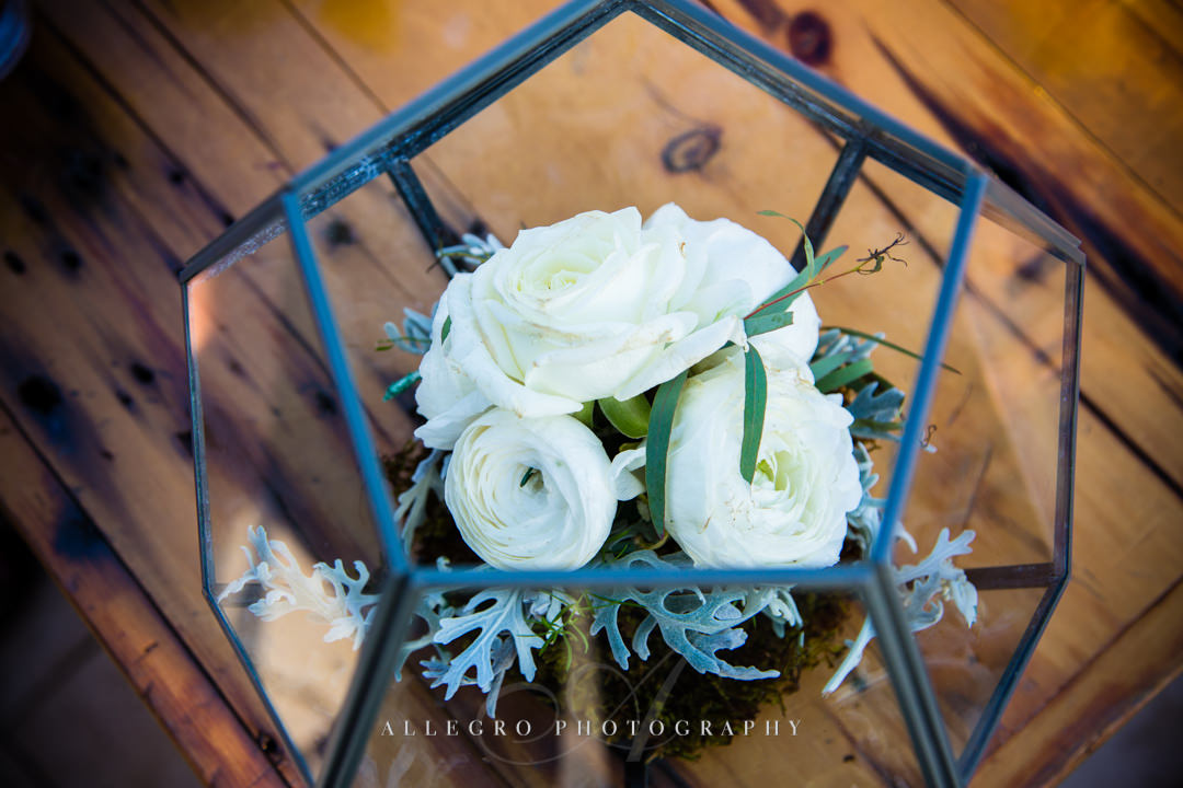 white and green floral wedding arrangements at mirbeau inn & spa - photo by allegro photography