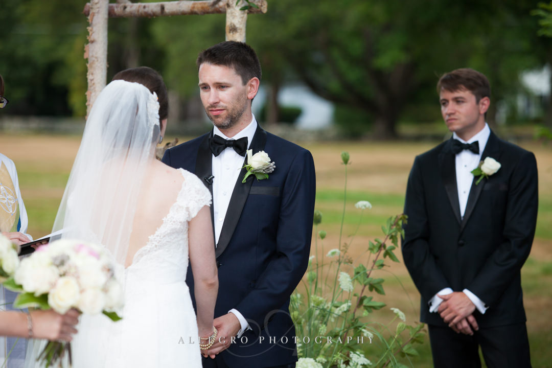 groom saying vows at the pierce house - photo by allegro photography