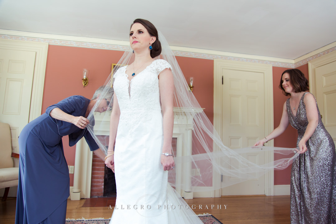 bride getting ready for her boson wedding - photo by allegro photography