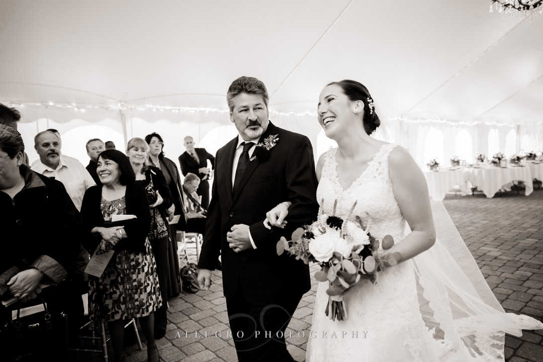 bride walking down the aisle at the stevens estate - photo by allegro photography