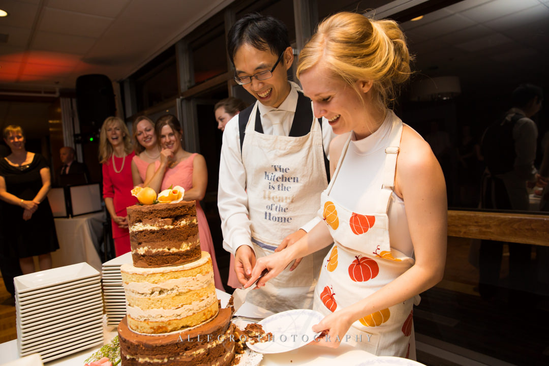 cutting the cake at wellesley college club - photo by allegro photography