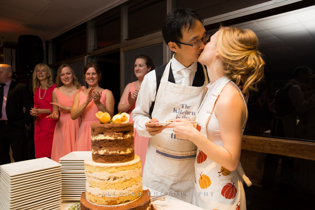tasting the cake at wellesley college club - photo by allegro photography
