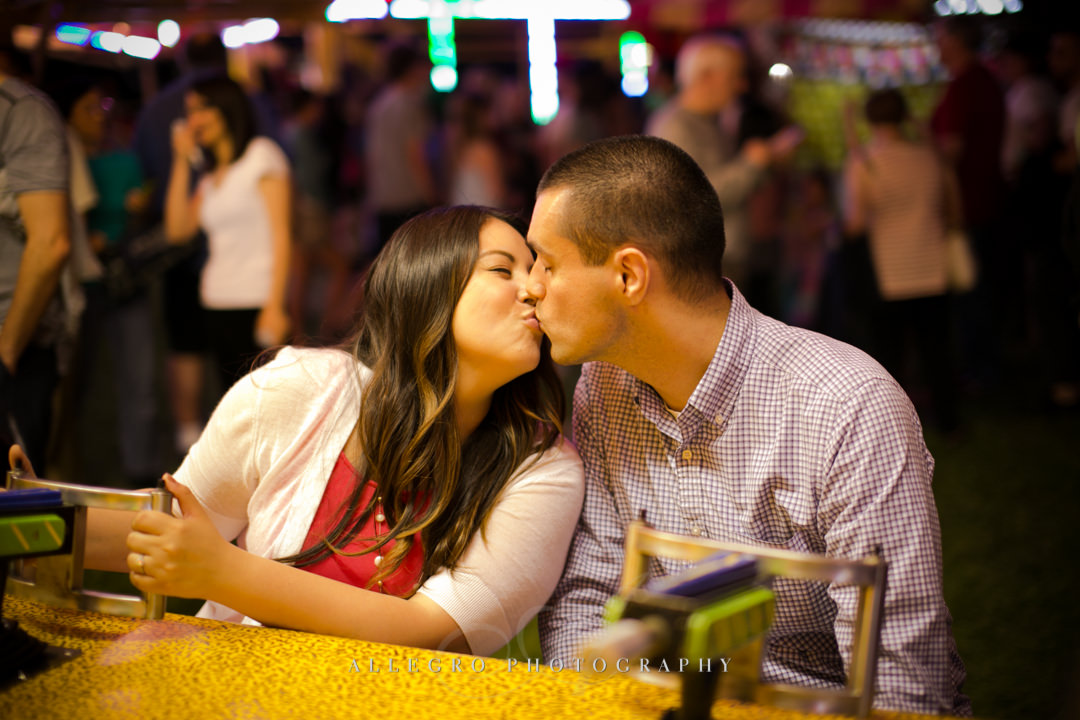 carnival engagement kiss - photographed by allegro photography