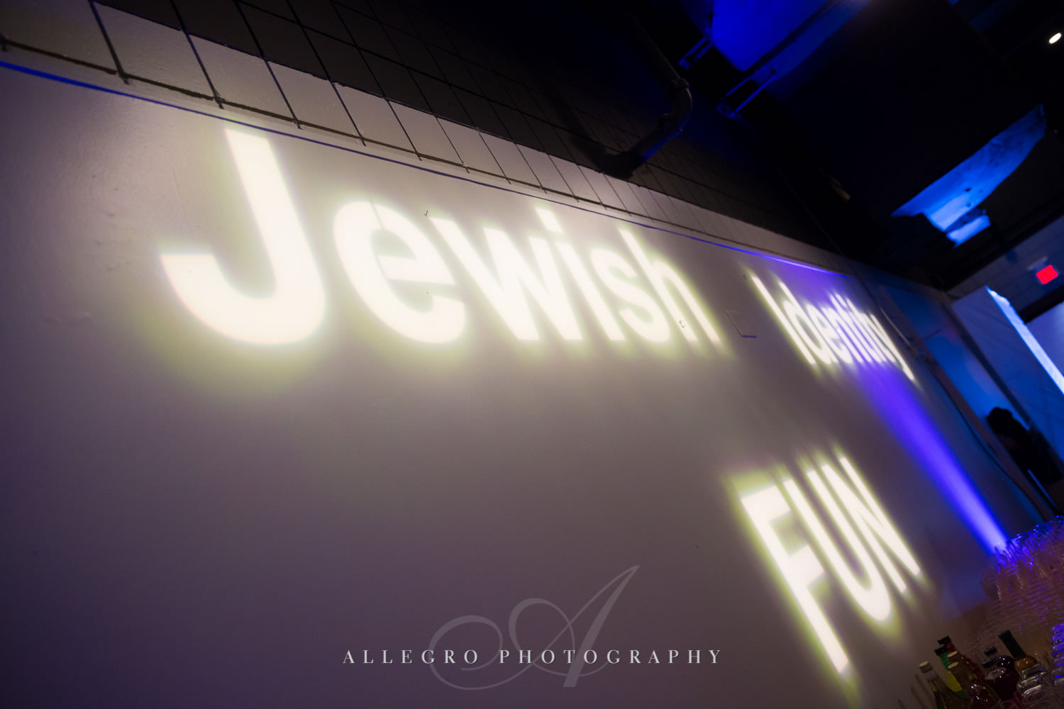 Projection decor at nonprofit event shot by Allegro Photography