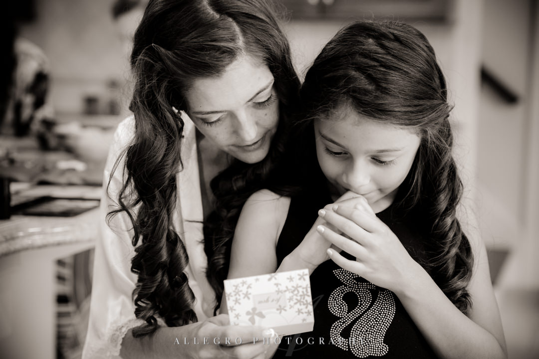 allegro photography photo: bride and flower girl read a note getting ready in needham ma