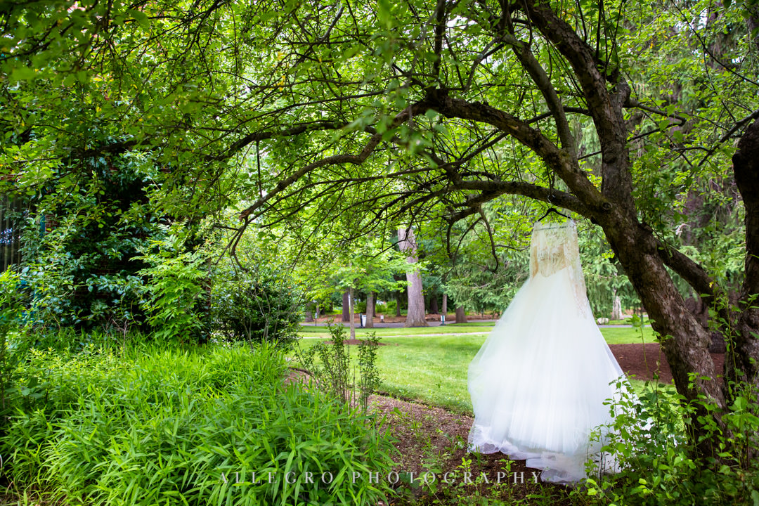 Wedding dress hanging from tree | Allegro Photography