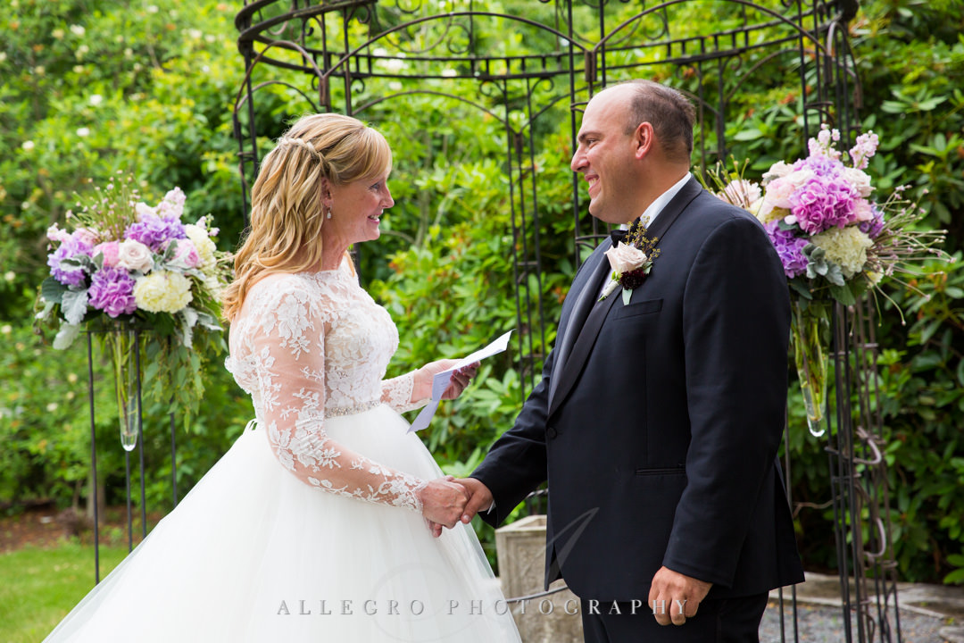 Bride says vows to husband at Gardens at Elm Bank | Allegro Photography