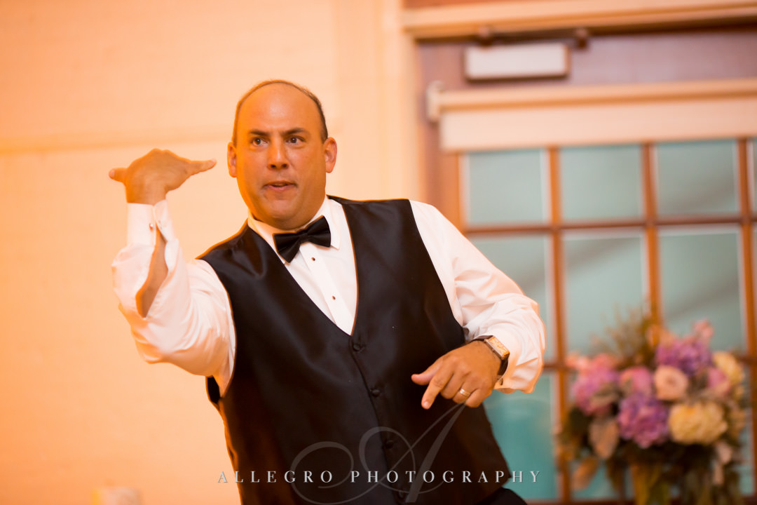 Groom does silly dance move | Allegro Photography