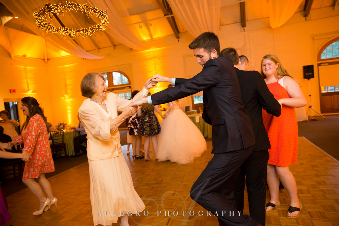 Grandma dances with grandson at wedding | Allegro Photography