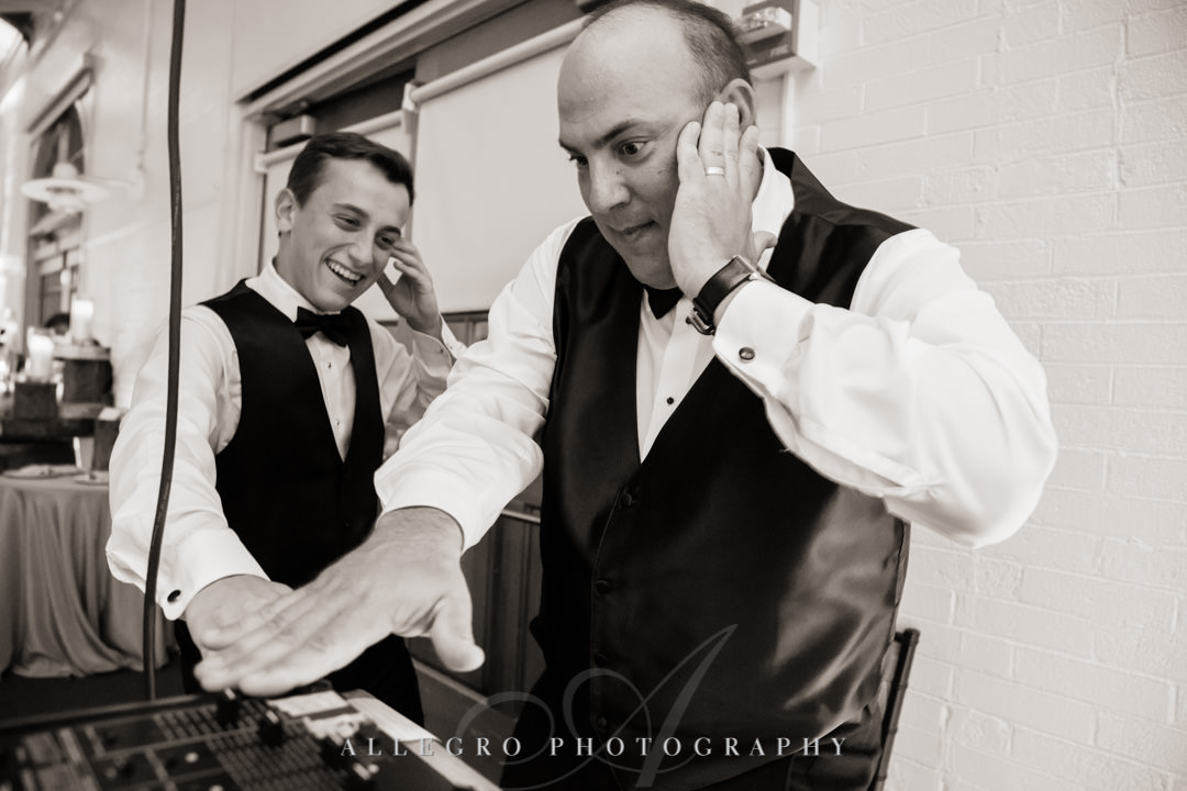 Groom and teenage son play DJ at wedding | Allegro Photography