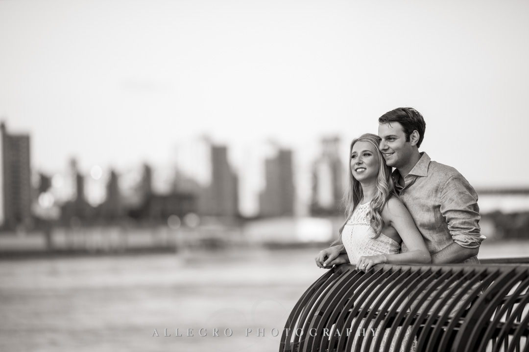 Fiancés looking out into New York City | Allegro Photography