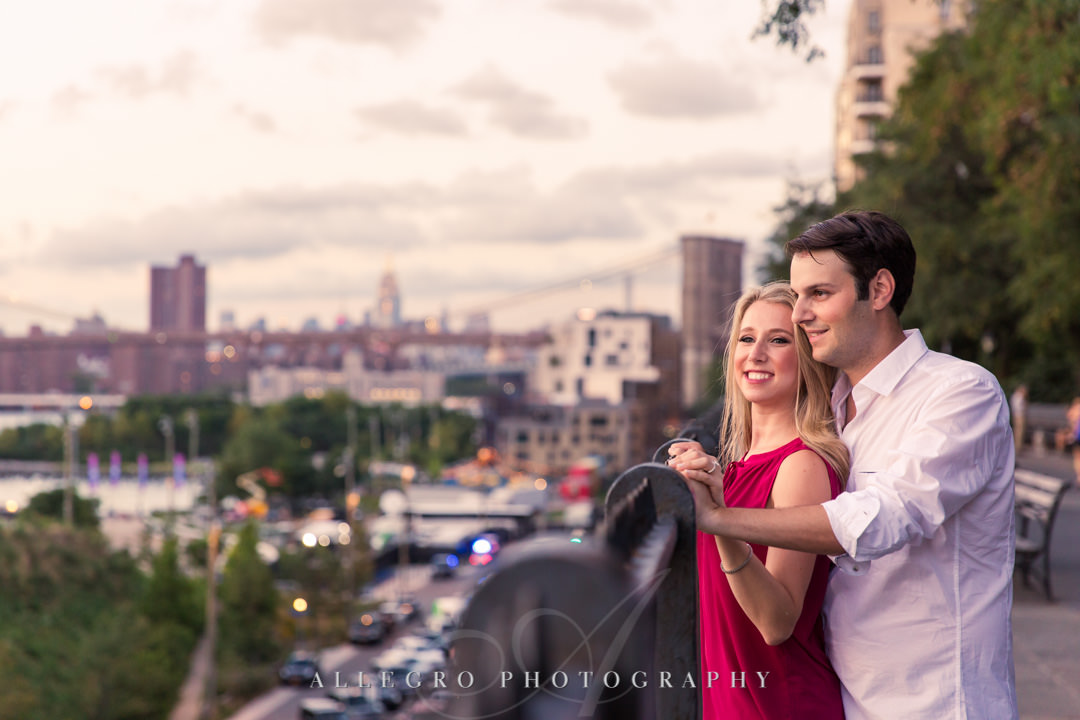 Young NYC couple staring out at city | Allegro Photography