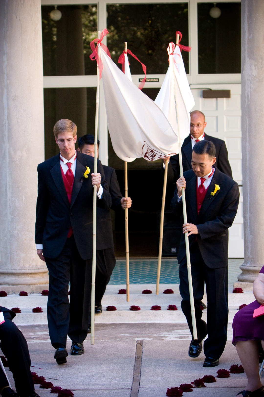 Groomsmen carry chuppah before wedding