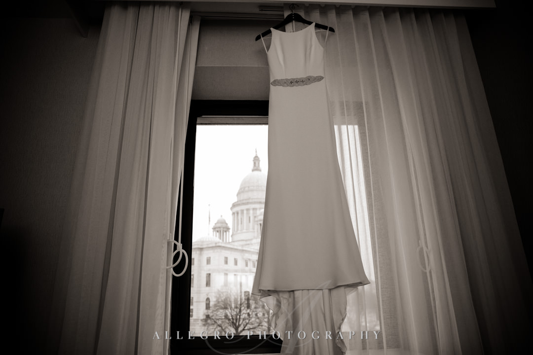 Wedding dress hangs in hotel