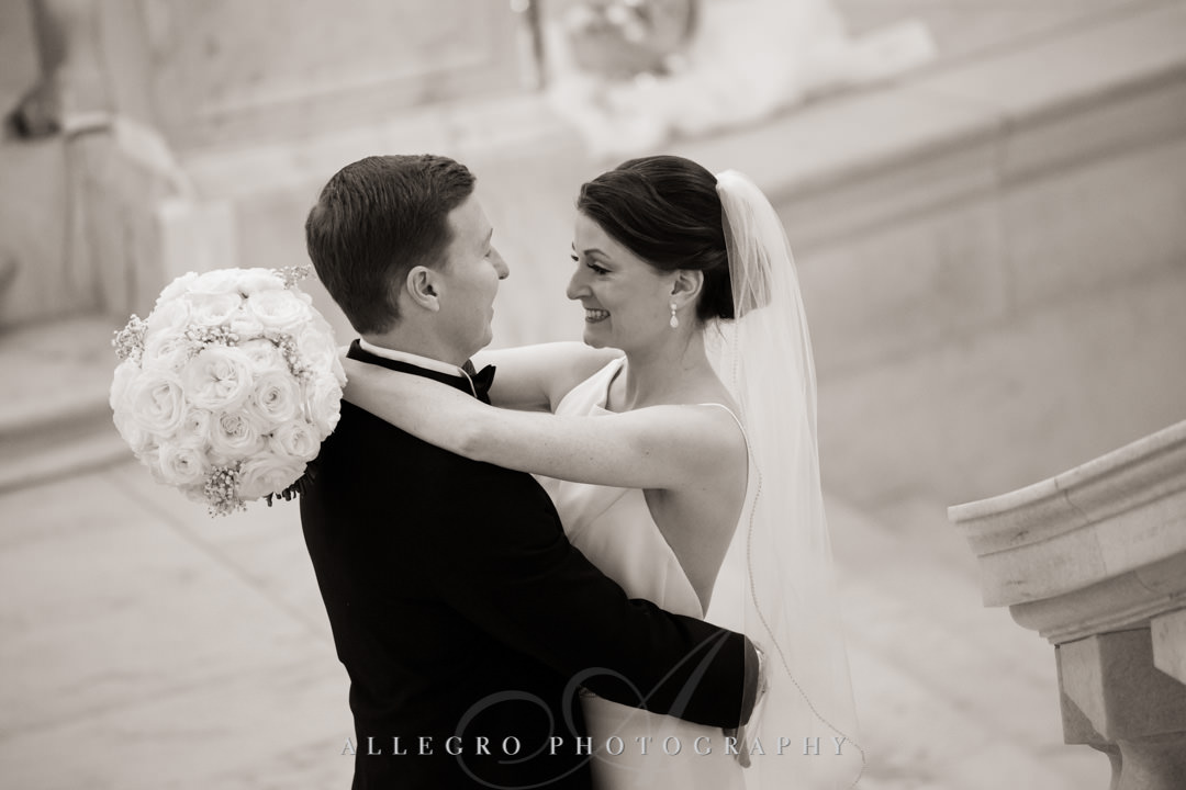 Bride and groom embrace before wedding