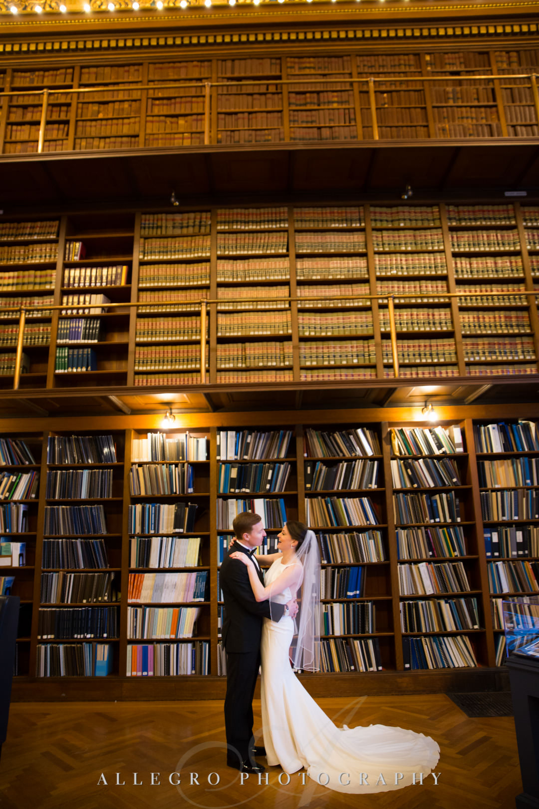 ri state house library- Bride and groom embrace in library stacks- rhode island state house