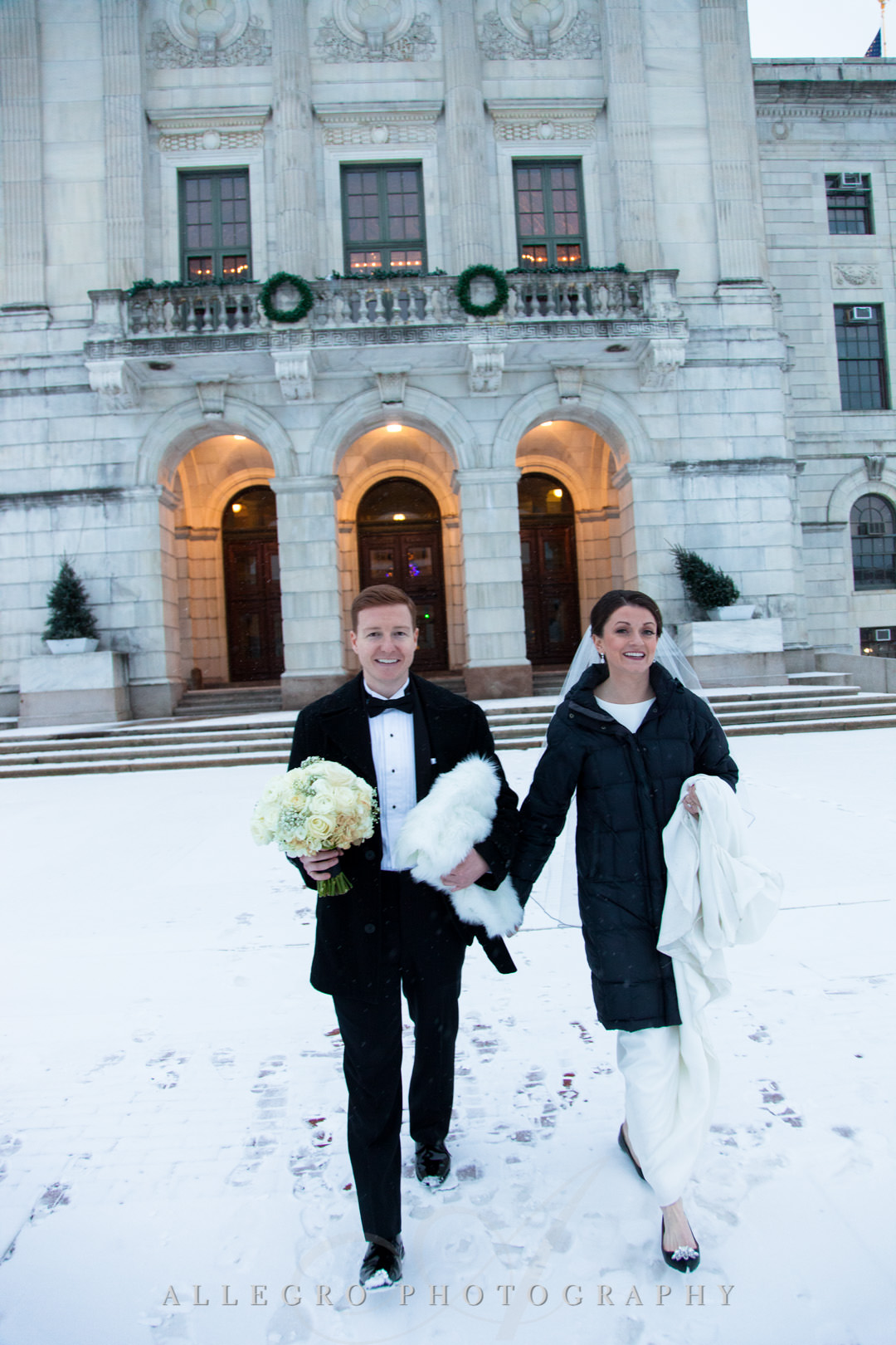 providence rhode island state house- Bride and groom walk in snowy Providence, RI