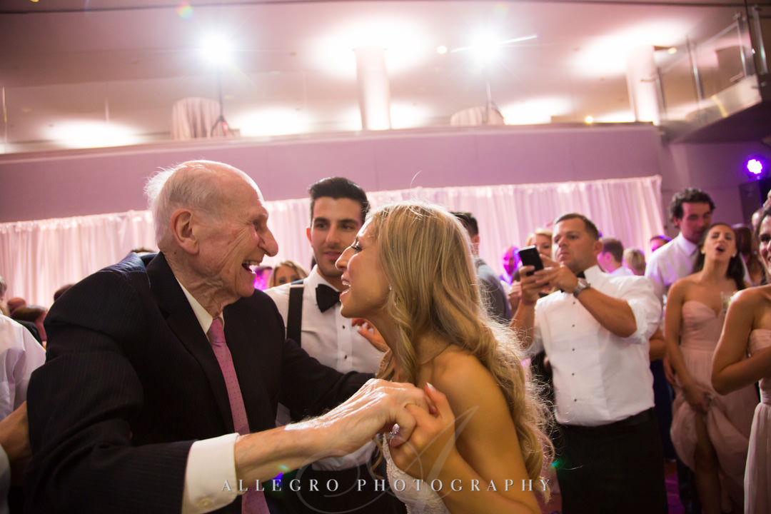 Bride makes silly face at her father