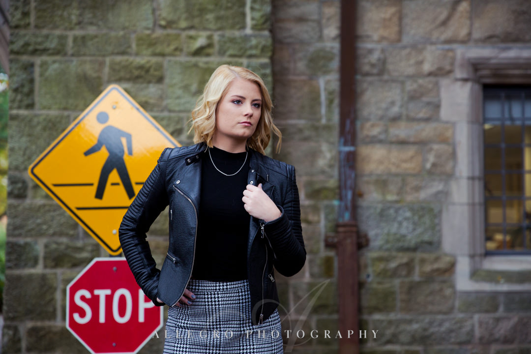 Blonde girl in leather jacket for high school senior portrait