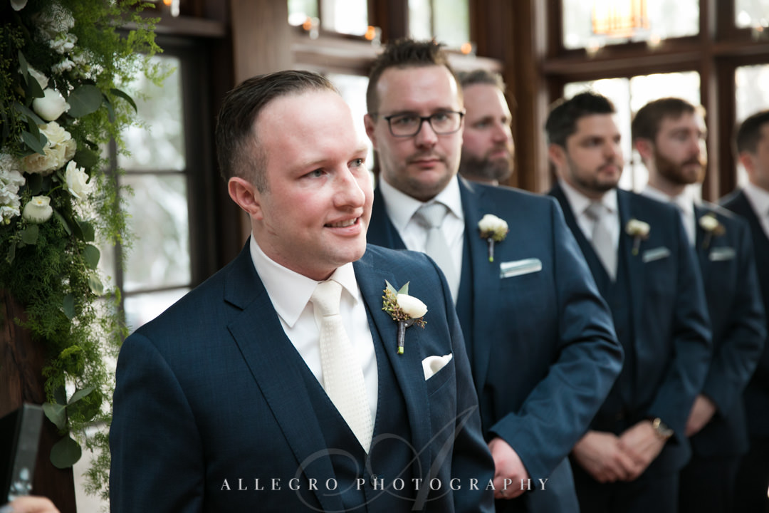 Groom anxiously awaits for bride at the alter