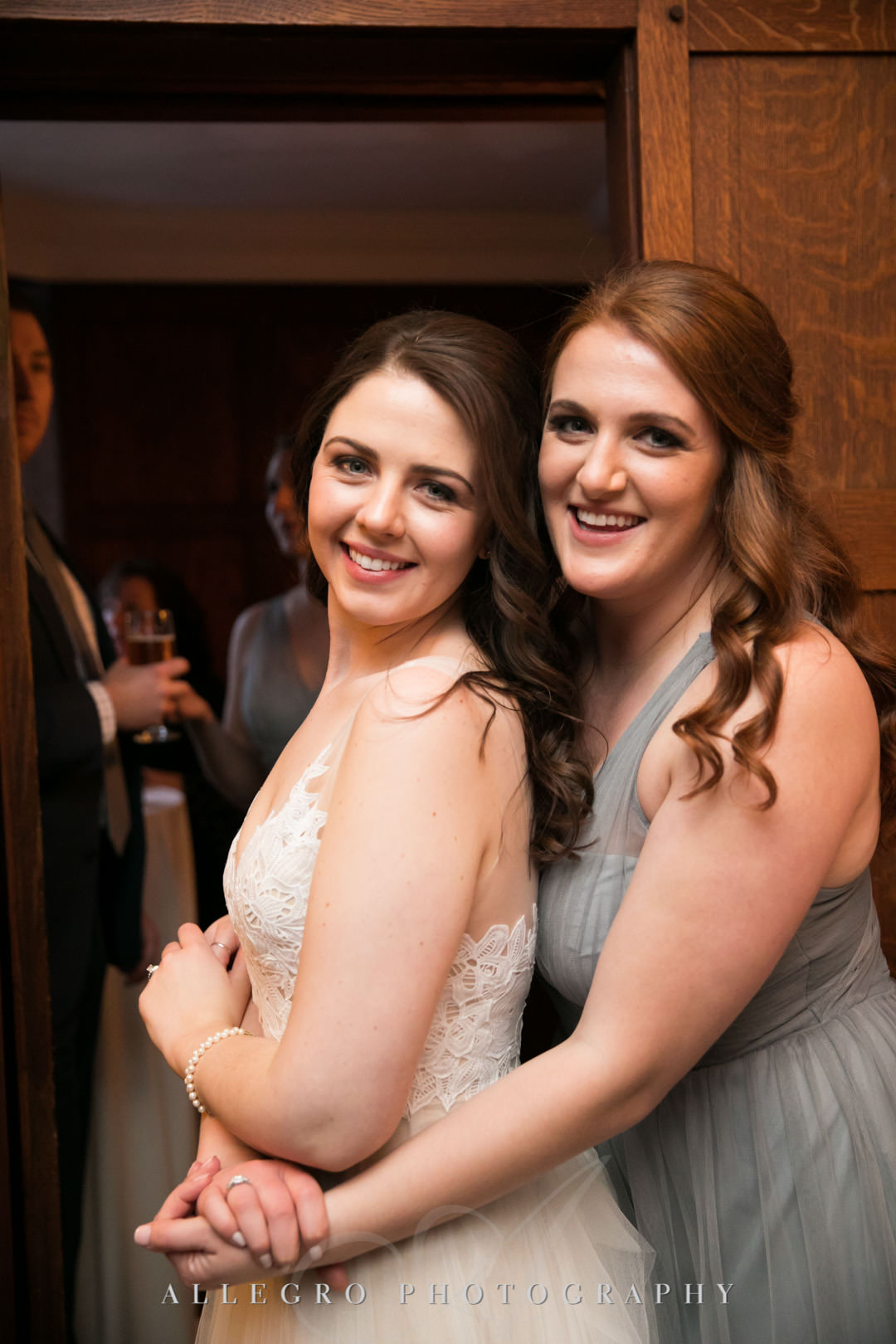 Bride poses with her maid of honor