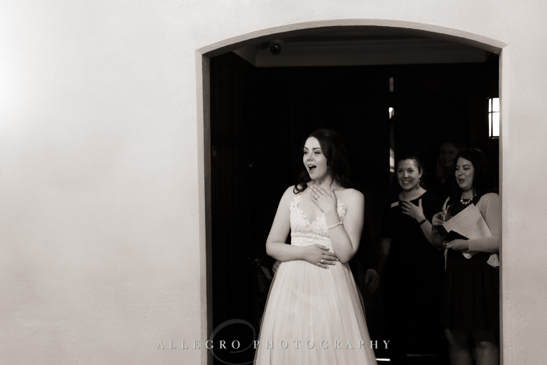 Bride excitedly enters reception room