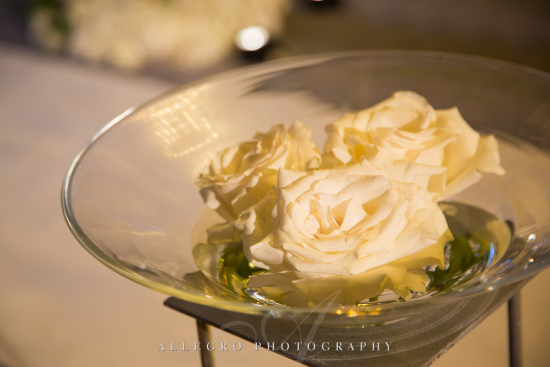 Flowers sitting in martini glass | Allegro Photography