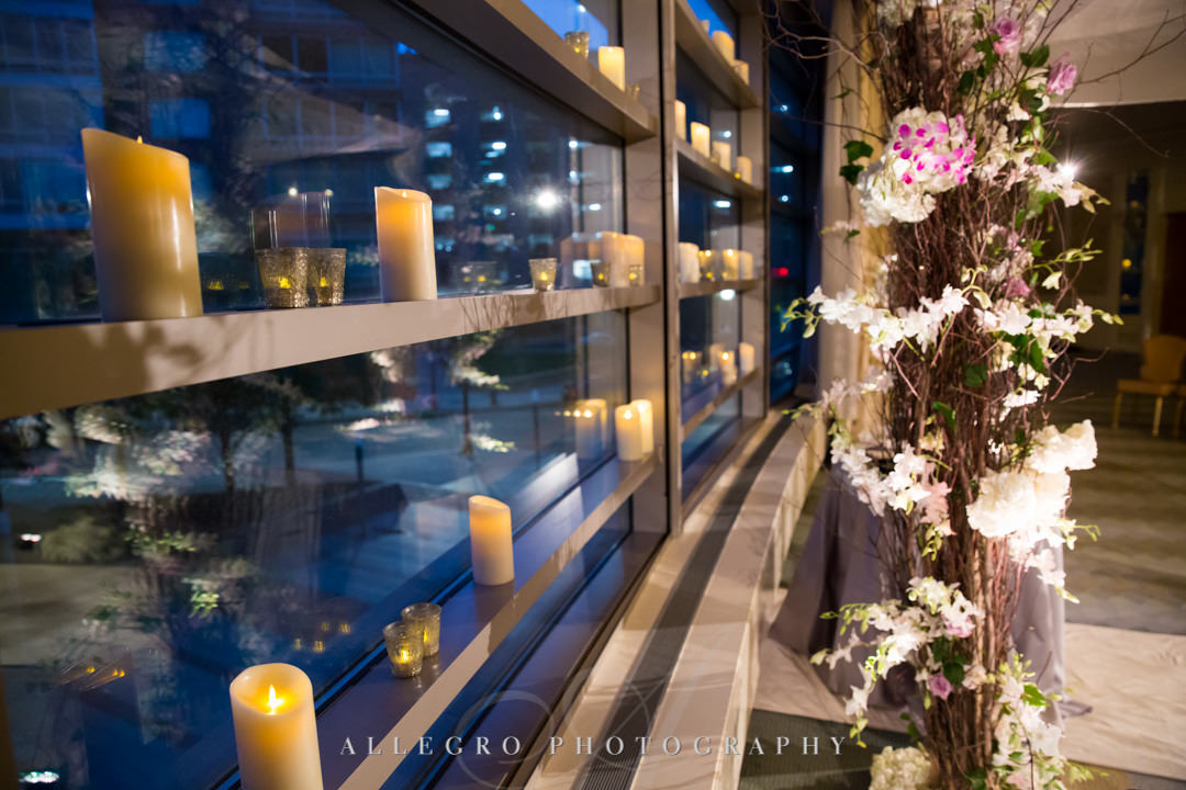 Candles lining windowsill at wedding | Allegro Photography